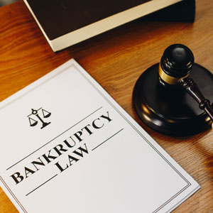 Document with 'BANKRUPTCY LAW' and a gavel, symbolizing legal process.